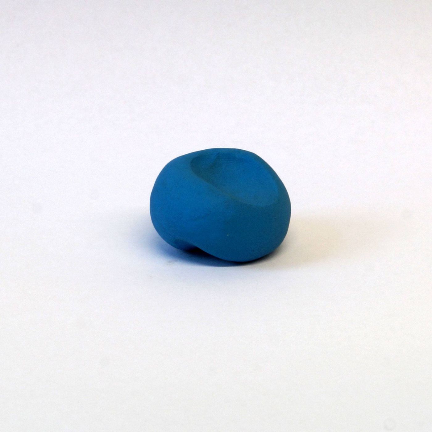 Plasticine ball after deformation